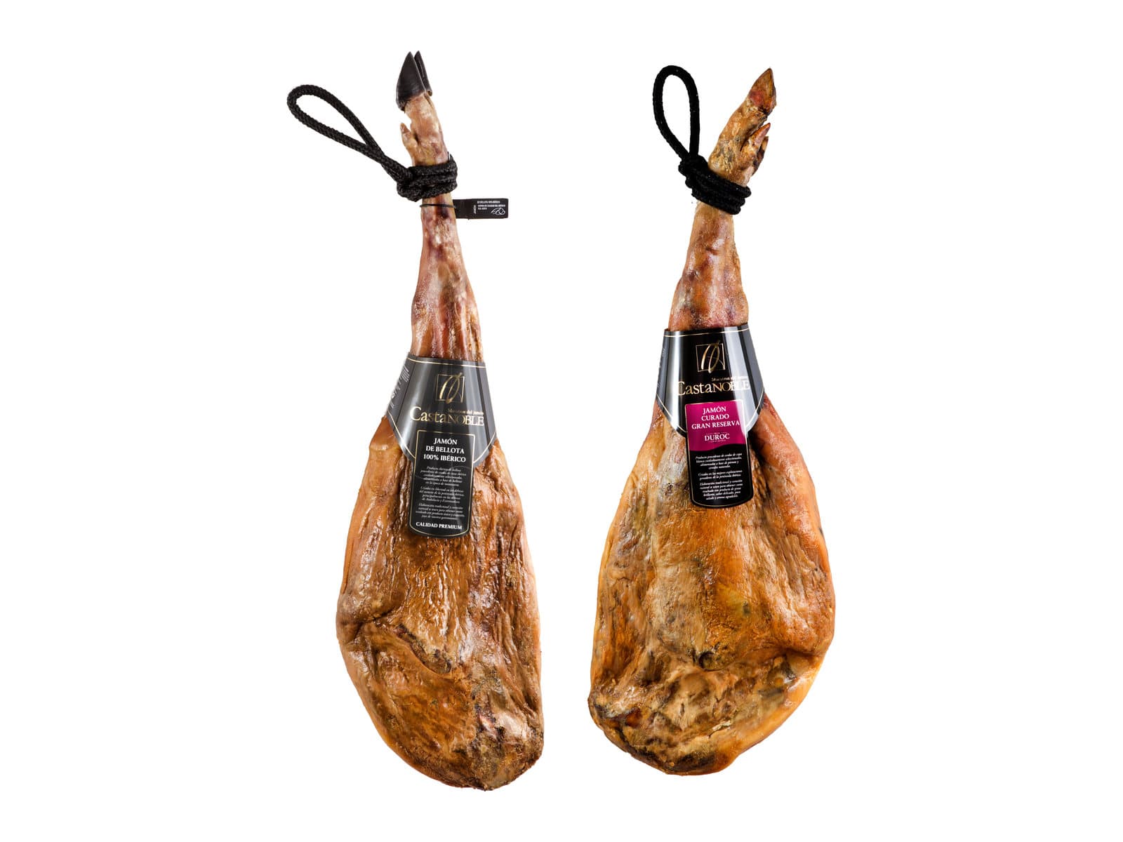 Castanoble's 100% Iberico Acorn-Fed Ham and Gran Reserva Cured Ham Cross Breed Duroc, side by side.